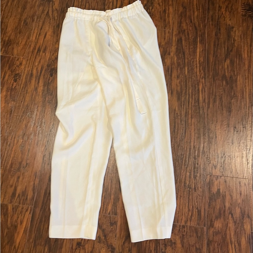 Express paper bag pull on dress pants. No size tag but I think they’re large